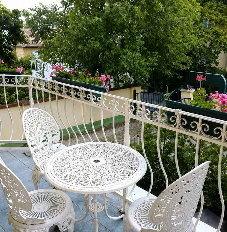 Sun terrace with garden views at the hotel in Buda, Budapest